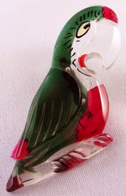 BP143 tinted lucite parrot pin